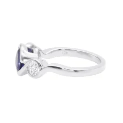 Unique Round Cut Tanzanite And Diamond Engagement Ring 18K White Gold -The King Of Accessories channel set round cut tanzanite and diamond engagement ring 18k gold backwh